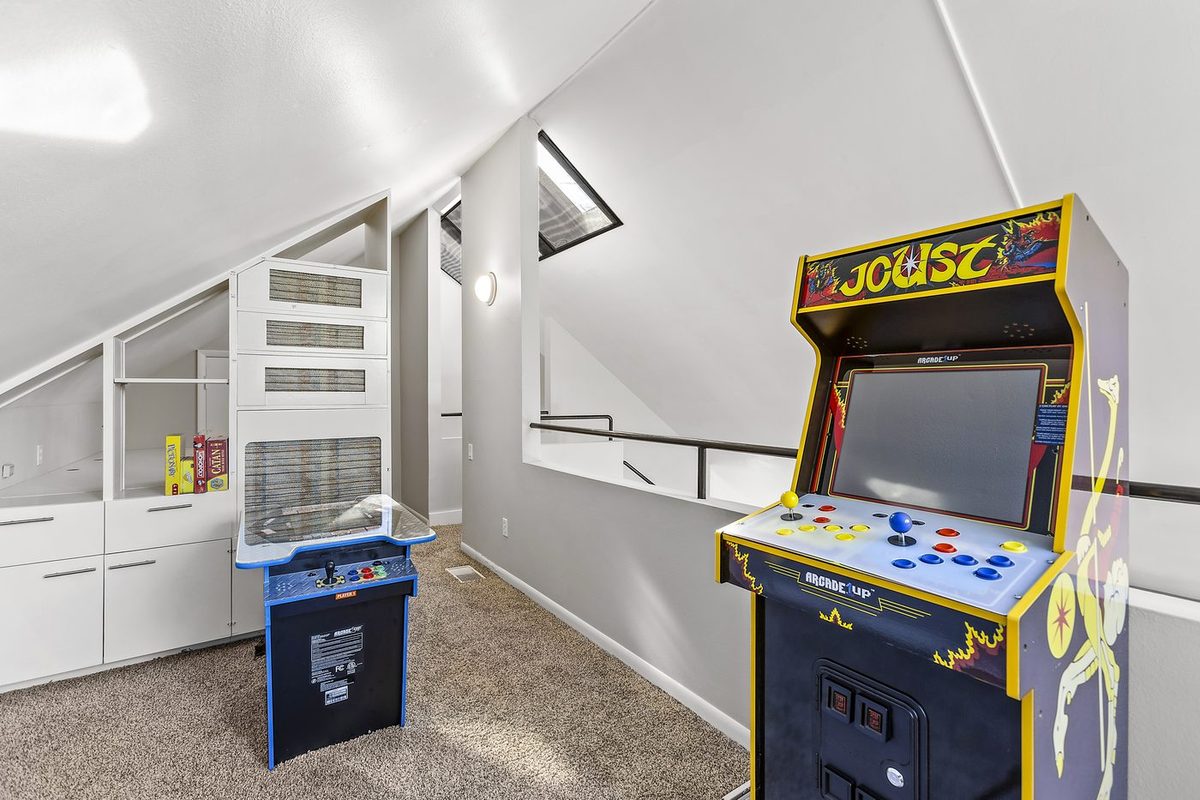 Third floor loft with arcade machines